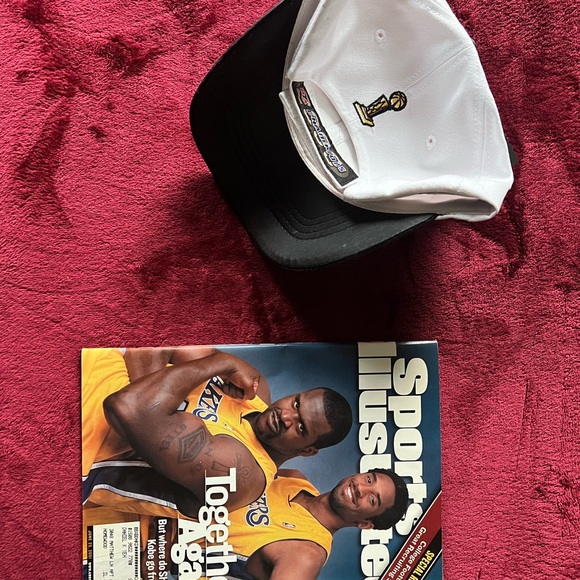 Lakers hat and magazine. Hat is new in box but has smudge on lid as pictured. - Picture 7 of 10